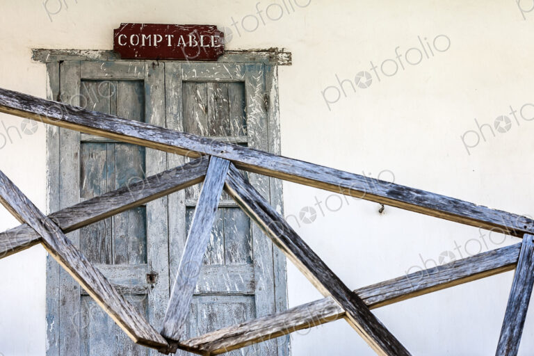Office of the accountant of the old prison of Nosy Lava, the door barred with wood.