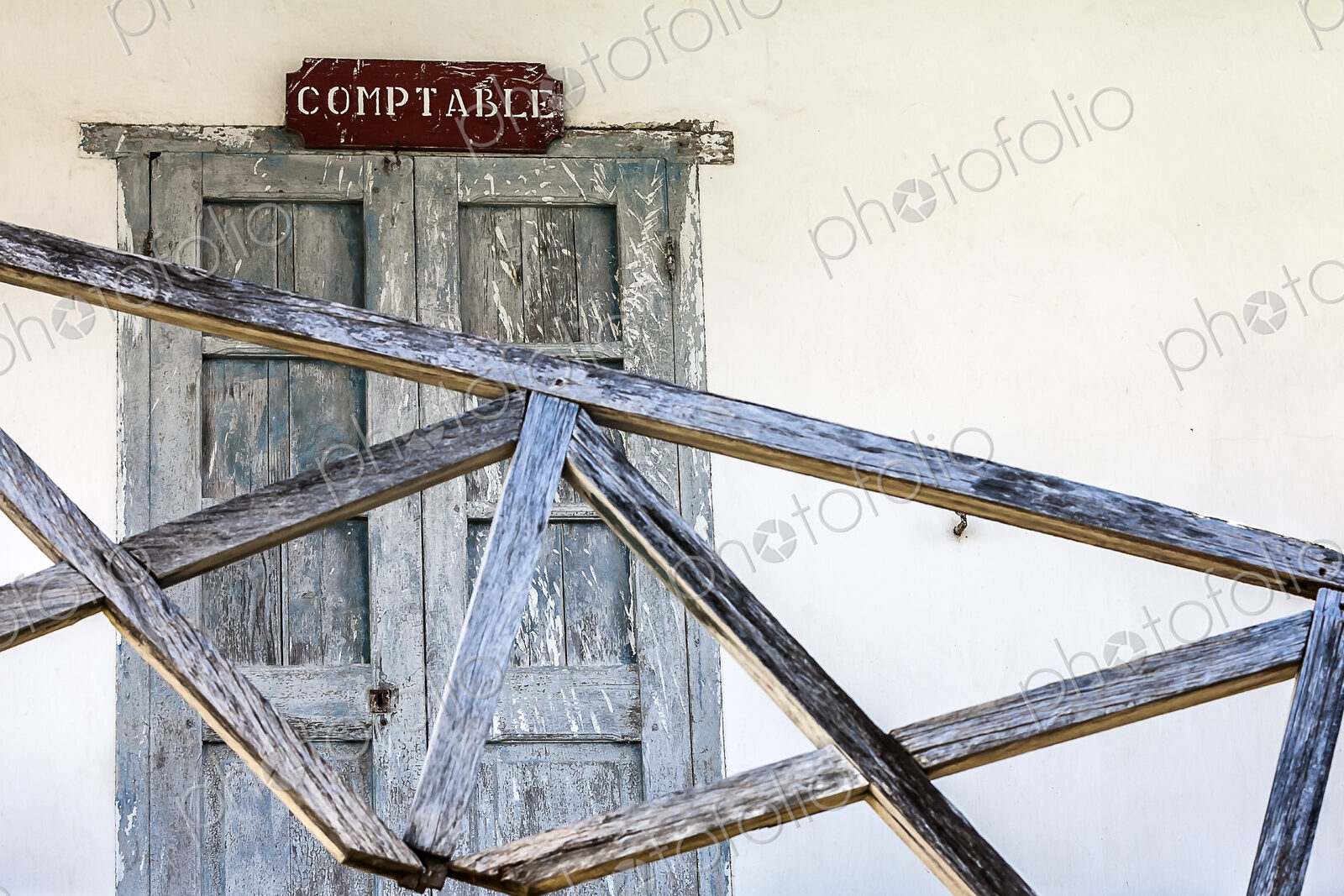 Office of the accountant of the old prison of Nosy Lava, the door barred with wood.