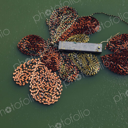 Oil Booms Attached to a Barge Oil Booms Attached to a Barge