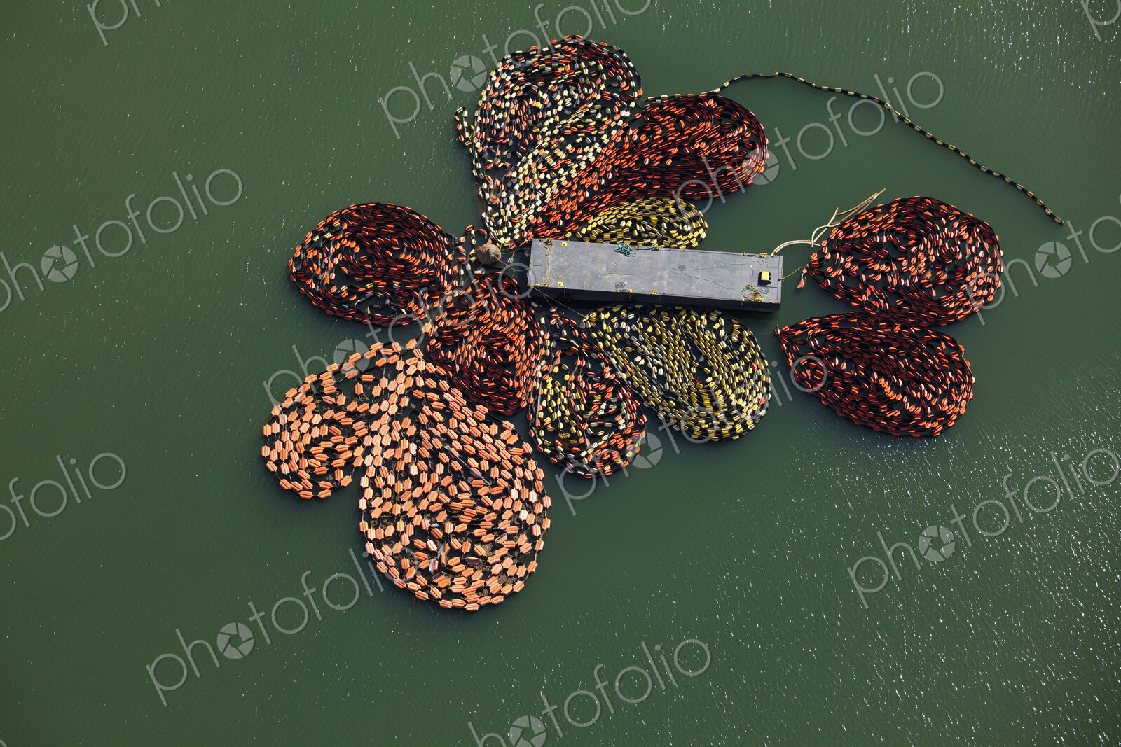 Oil Booms Attached to a Barge