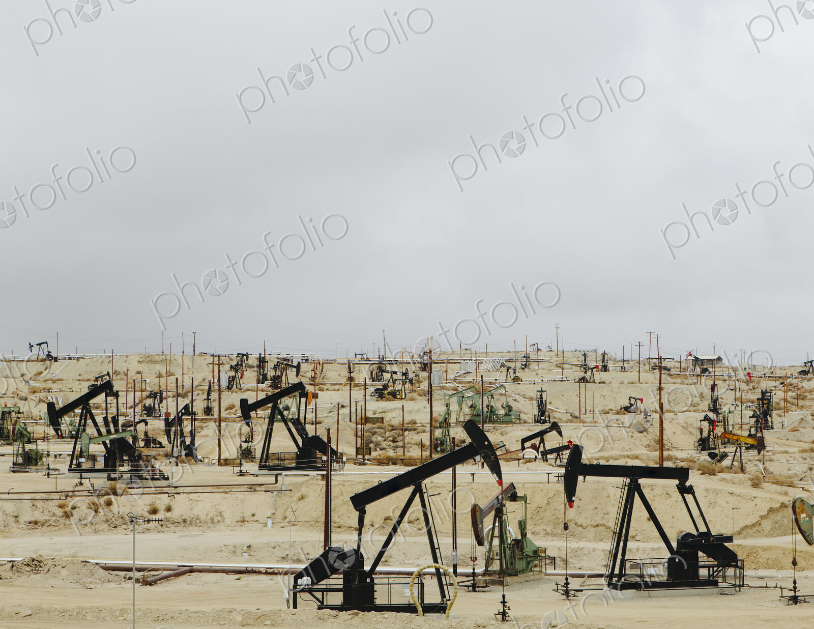 Oil rigs and wells in the Midway-Sunset shale oil fields, the largest in California
