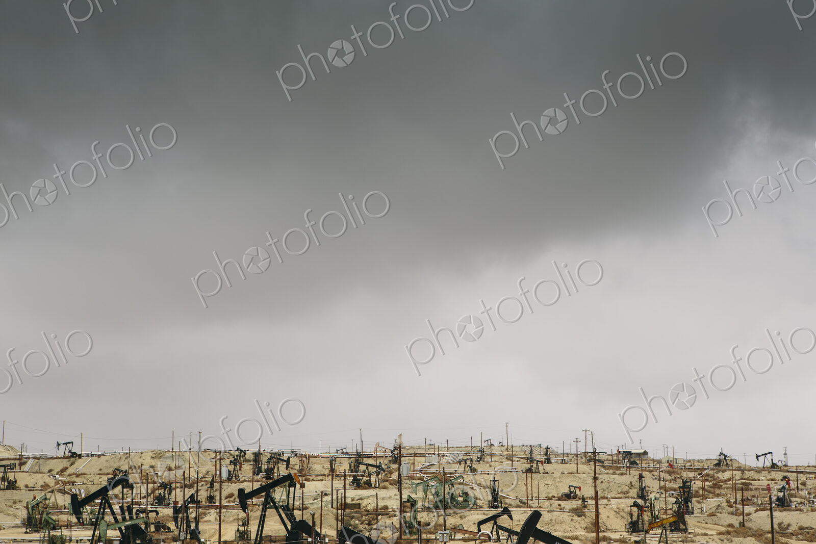 Oil rigs and wells in the Midway-Sunset shale oil fields, the largest in California