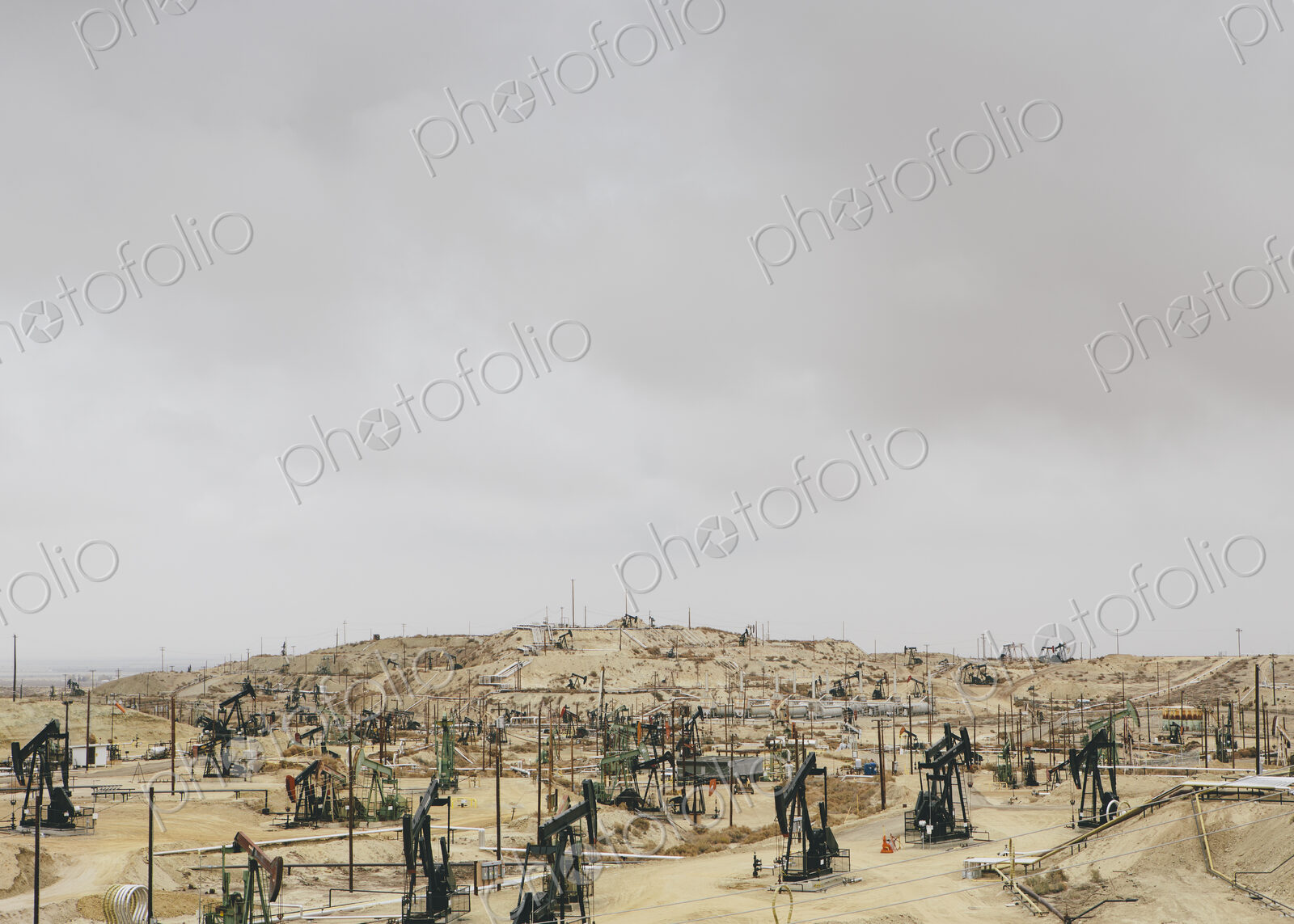 Oil rigs and wells in the Midway-Sunset shale oil fields, the largest in California