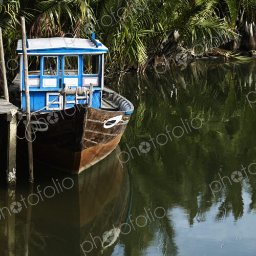Old Boat at a Tropical Dock Old Boat at a Tropical Dock
