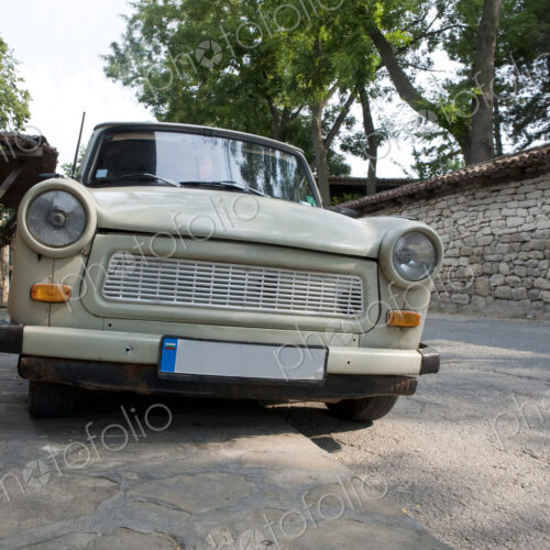 Old East German manufactured car, a Trabbi or Trabant, parked, low angle view of the…