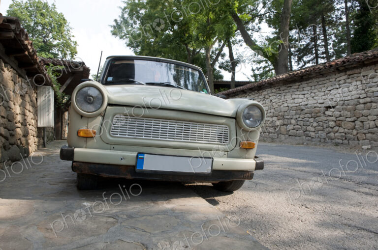 Old East German manufactured car, a Trabbi or Trabant, parked, low angle view of the…