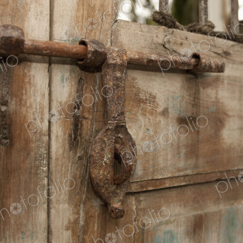 Old Iron Door Latch on Wooden Door Old Iron Door Latch on Wooden Door