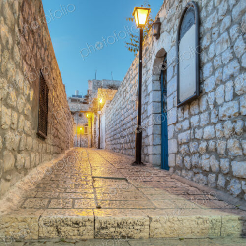 Old Stone Alleyway With Electric Lights Old Stone Alleyway With Electric Lights