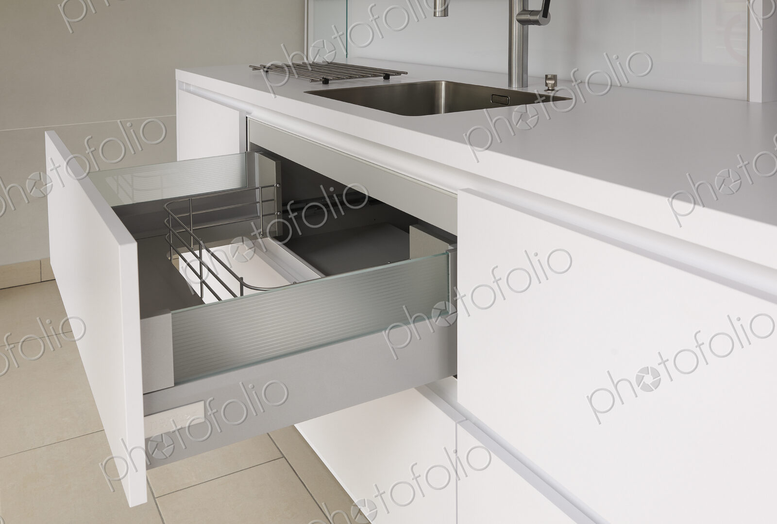 Open drawer in modern kitchen