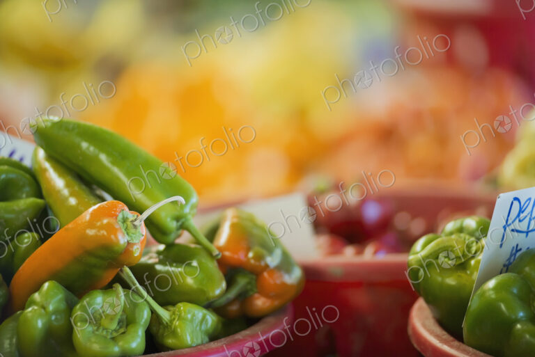 Organic Assorted Green Peppers on display