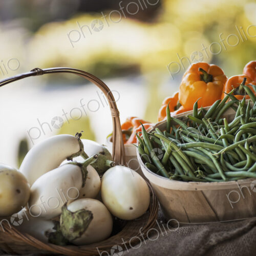 Organic Vegetable on Display; Organic White Eggplant; Green Beans; Yellow and Red Bell… Organic Vegetable on Display; Organic White Eggplant; Green Beans; Yellow and Red Bell…