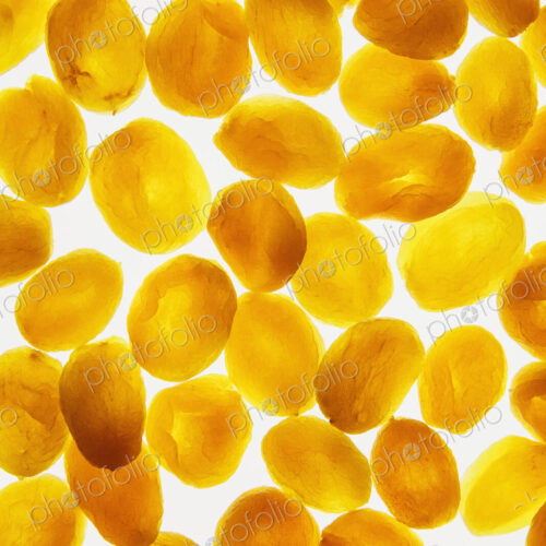 Organic apricots on white background