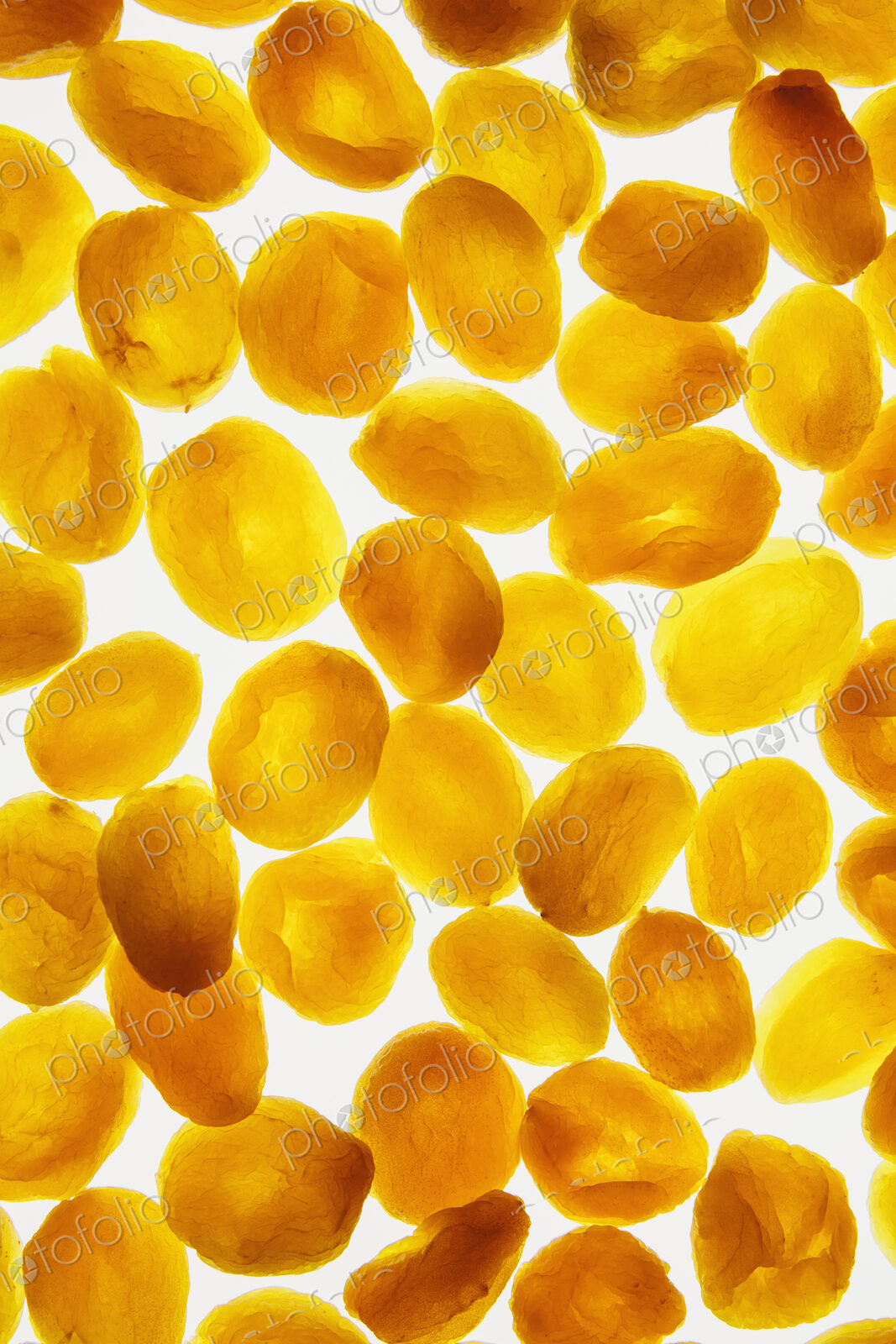 Organic apricots on white background