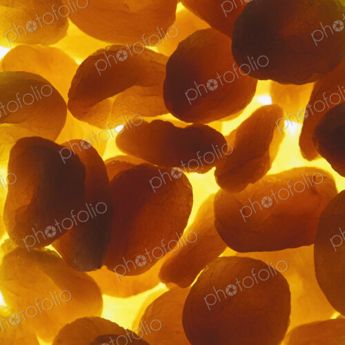 Organic apricots on white background