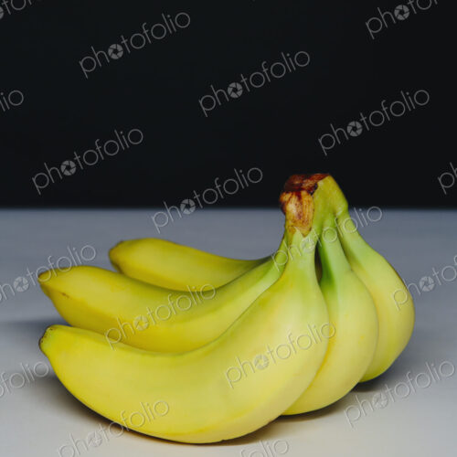 Organic bananas, in a bunch.