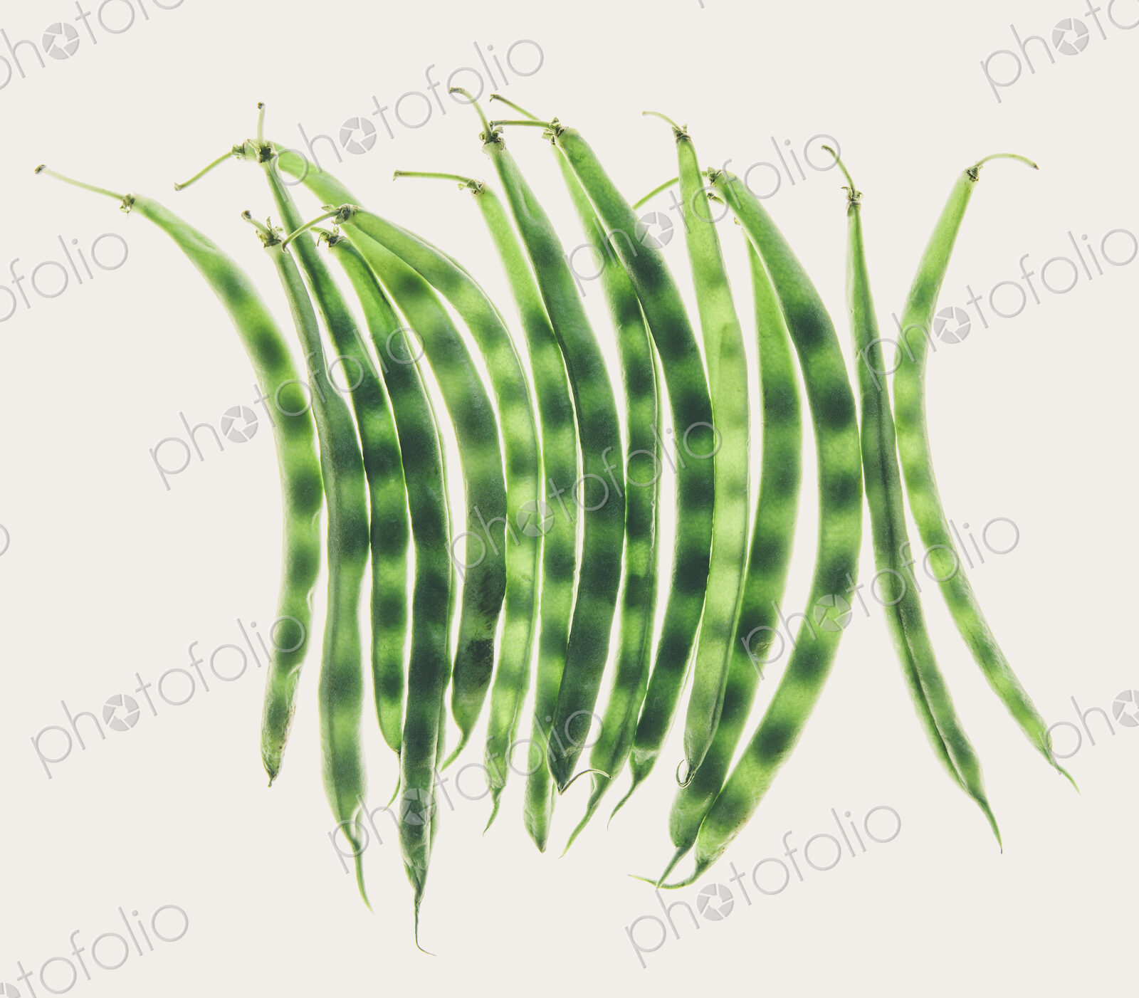 Organic green string beans on white background