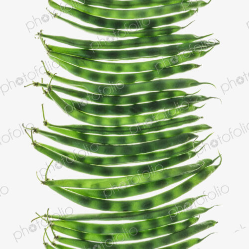 Organic green string beans on white background
