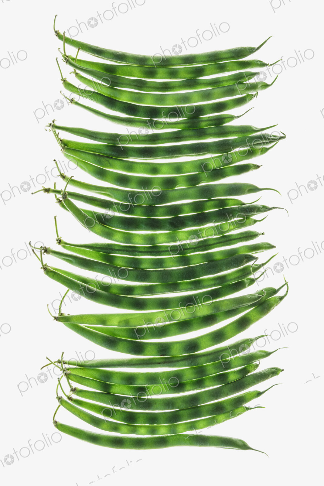 Organic green string beans on white background