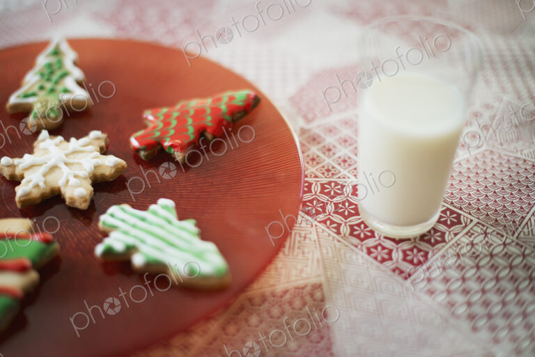 Organic homemade Christmas cookies and a glass of milk.
