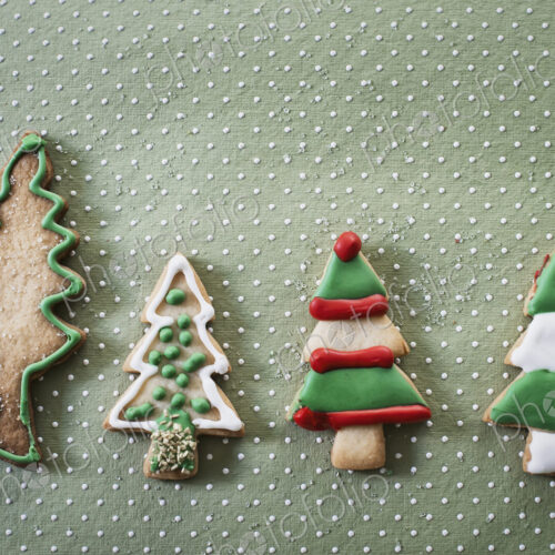 Organic homemade Christmas cookies shaped like Christmas trees, iced with green, red… Organic homemade Christmas cookies shaped like Christmas trees, iced with green, red…