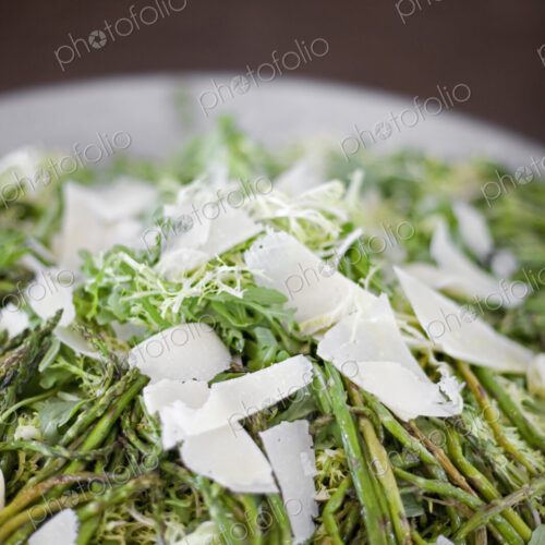 Organic prepared vegetable dish for a party. Farmstand. Grilled Asparagus and Frise…