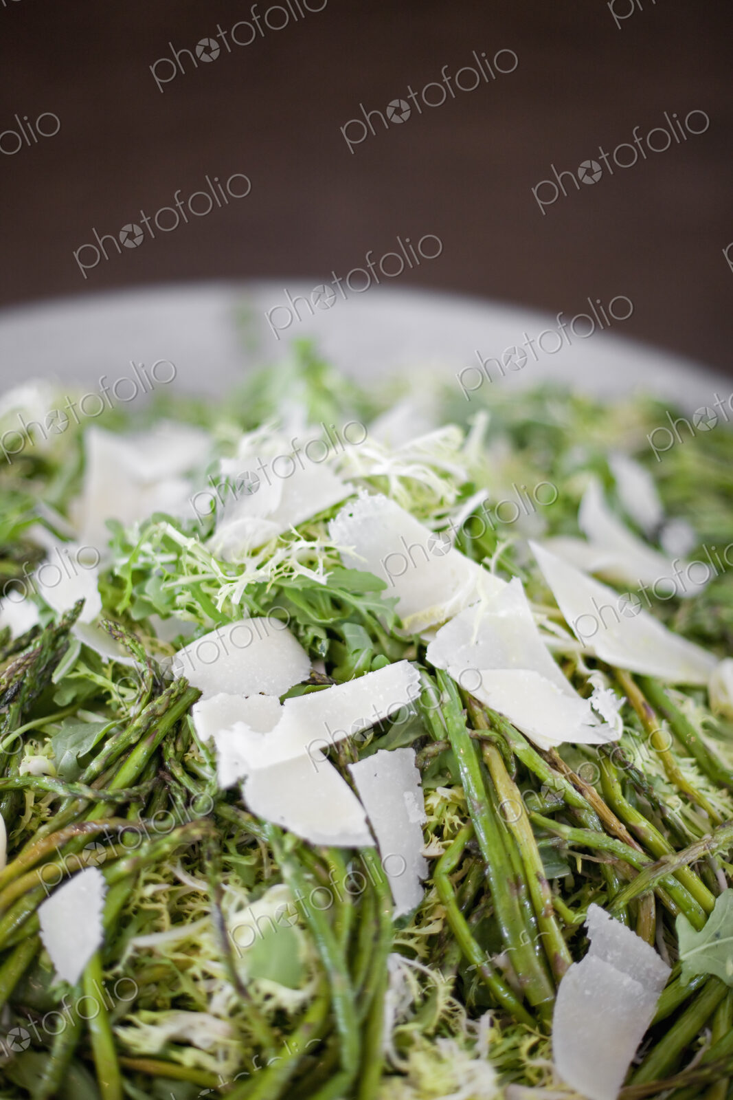 Organic prepared vegetable dish for a party. Farmstand. Grilled Asparagus and Frise…