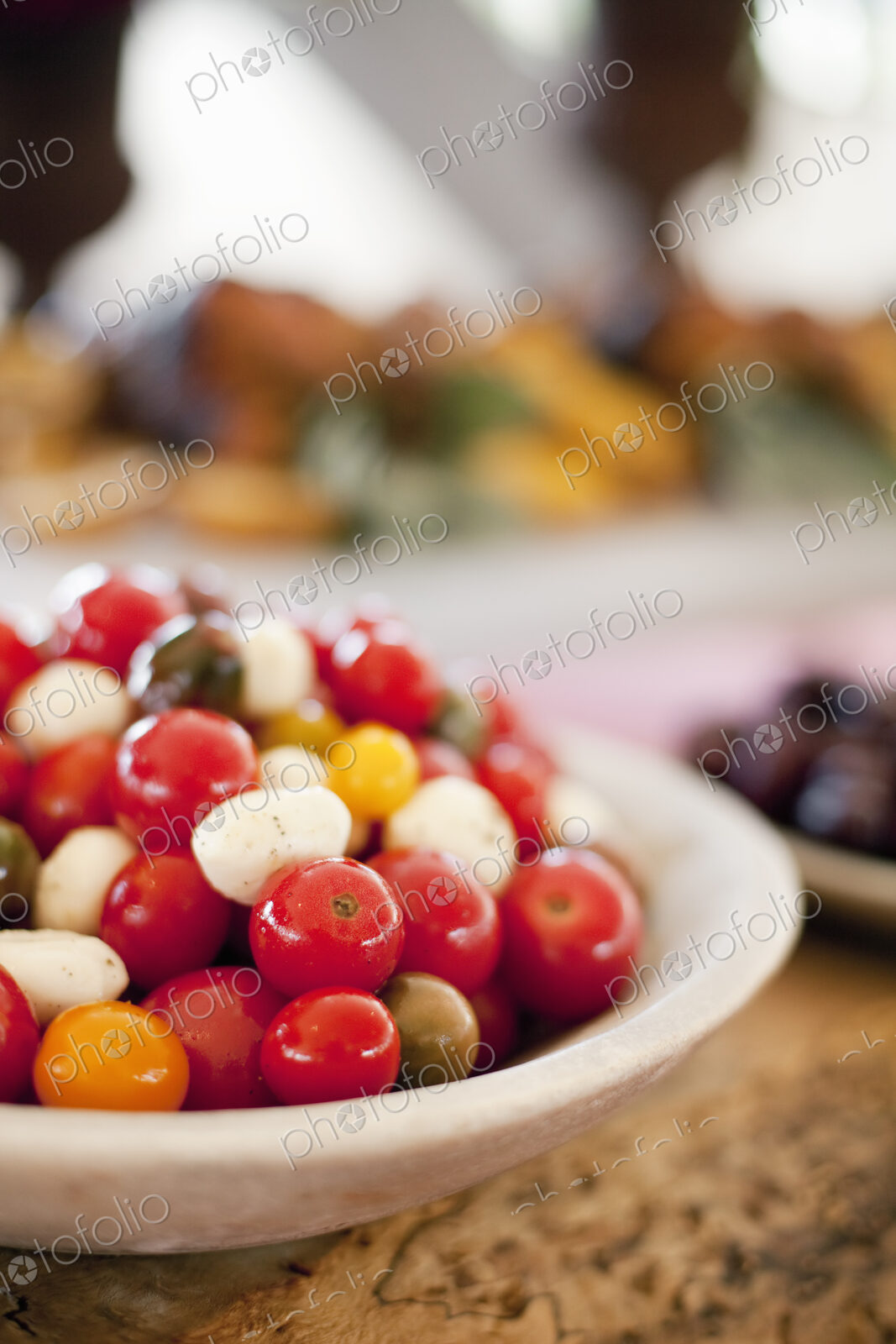 Organic prepared vegetables on a dish, laid out for a party. Heirloom red and orange…