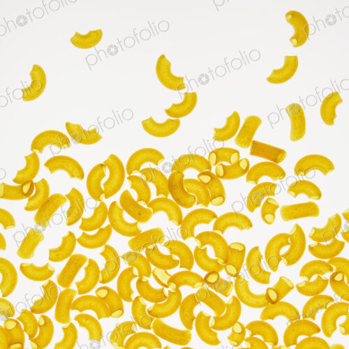 Organic quinoa macaroni pasta elbows, white background (pasta is gluten free) Organic quinoa macaroni pasta elbows, white background (pasta is gluten free)