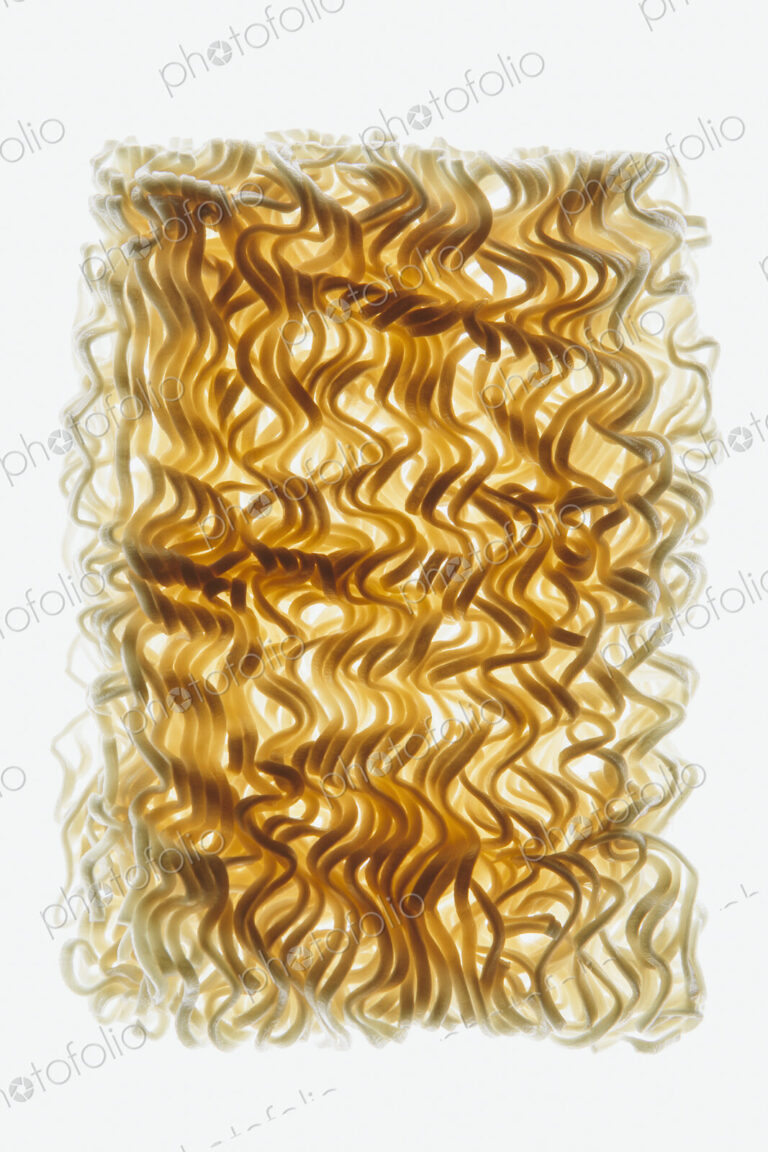 Organic (wheat flour) ramen noodles on white background