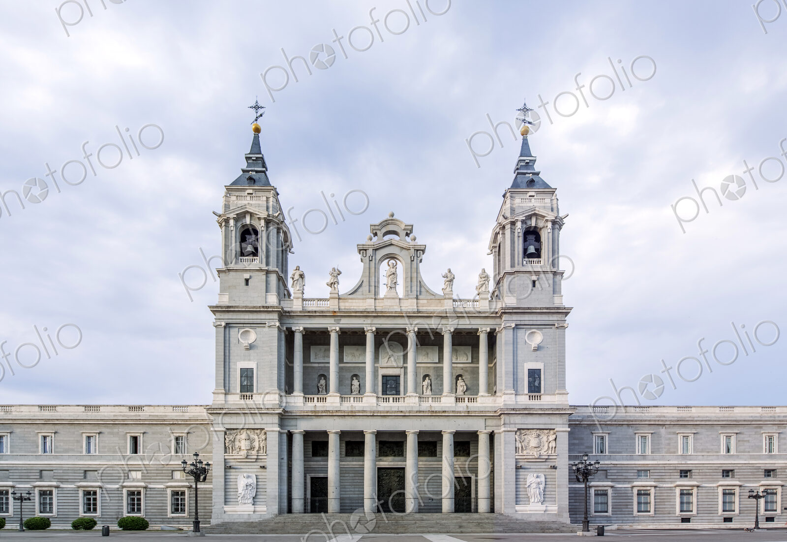 Ornate cathedral and cloudy sky, Madrid, Madrid, Spain