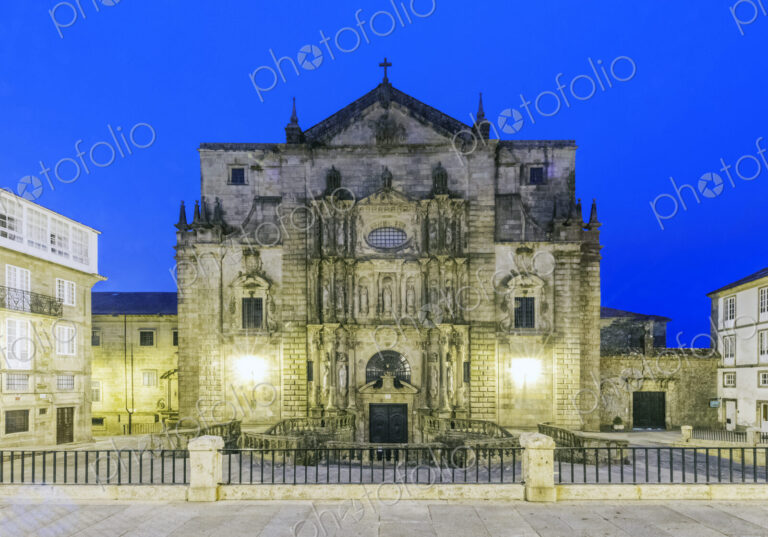 Ornate church illuminated at night, Santiago de Compostela, A Coruna, Spain