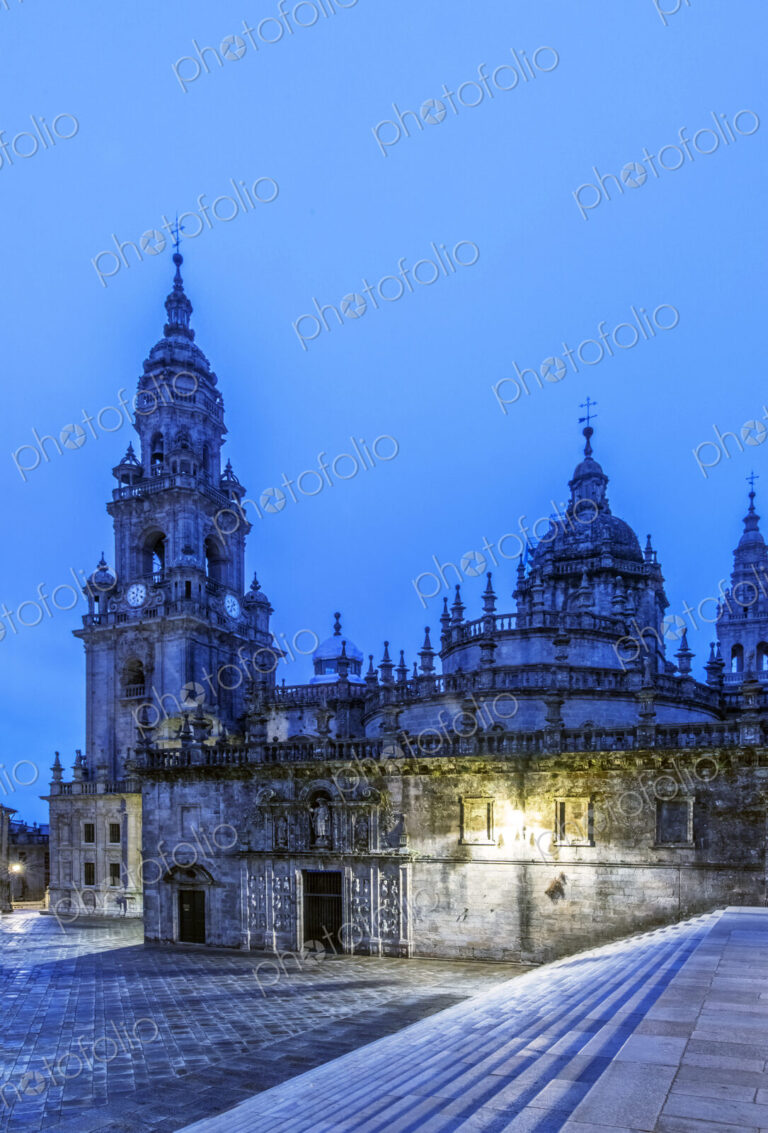 Ornate church illuminated at night, Santiago de Compostela, A Coruna, Spain
