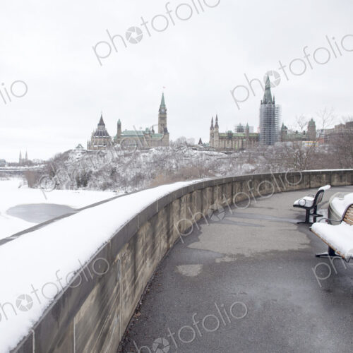 Ottawa in winter, riverside walk and view to the old city and the landmarks of the…