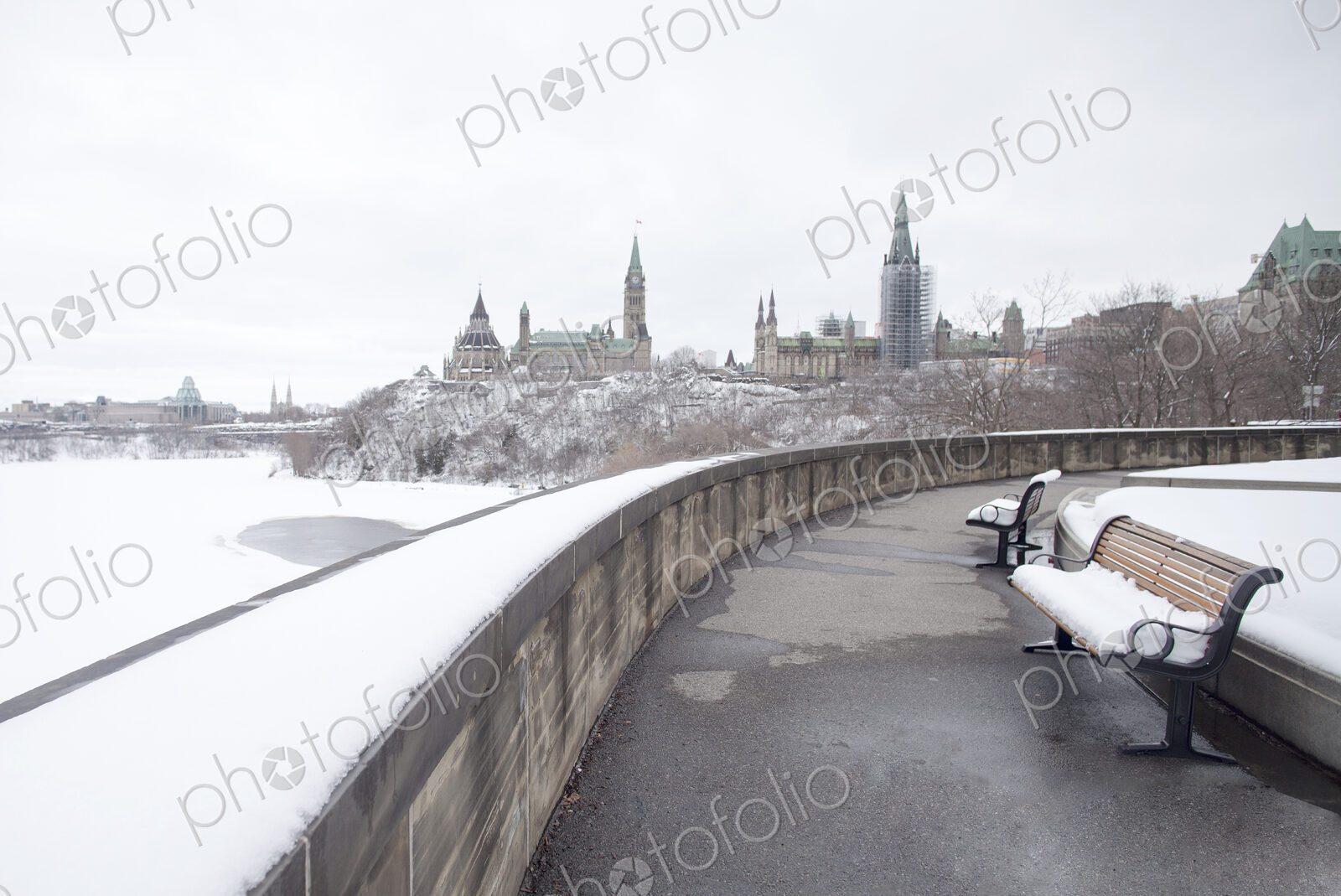 Ottawa in winter, riverside walk and view to the old city and the landmarks of the…