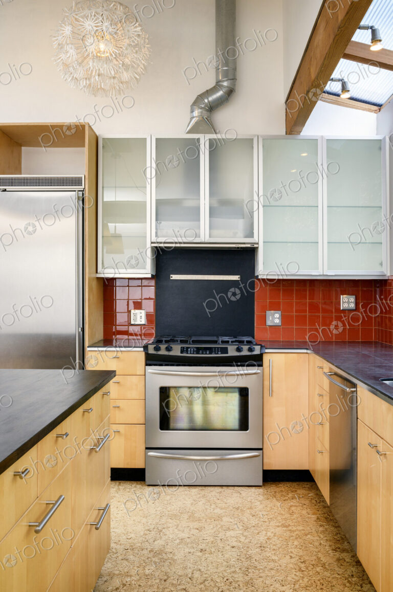 Oven, countertop and cabinets in modern kitchen