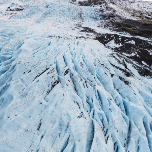 Overhead View of Falljokul Glacier, the frozen outlet of the vast Vatnajökull ice cap,… Overhead View of Falljokul Glacier, the frozen outlet of the vast Vatnajökull ice cap,…