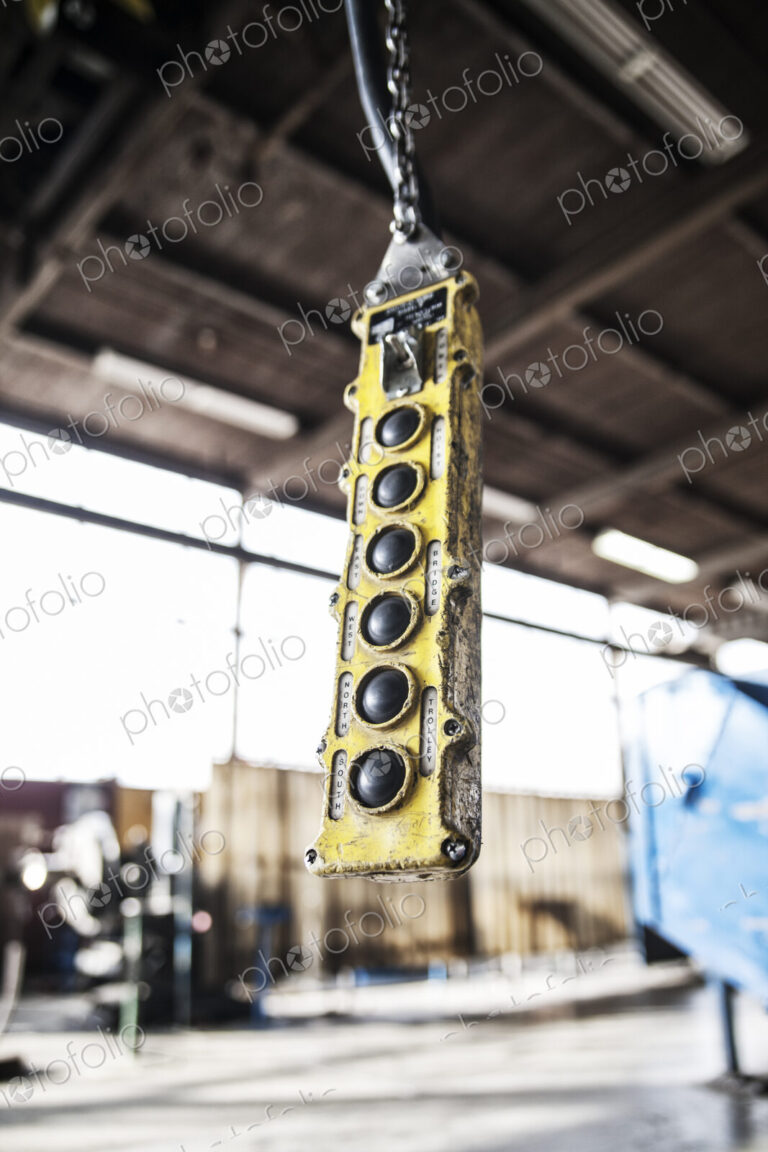 Overhead lift control unit used in a sheet metal factory.