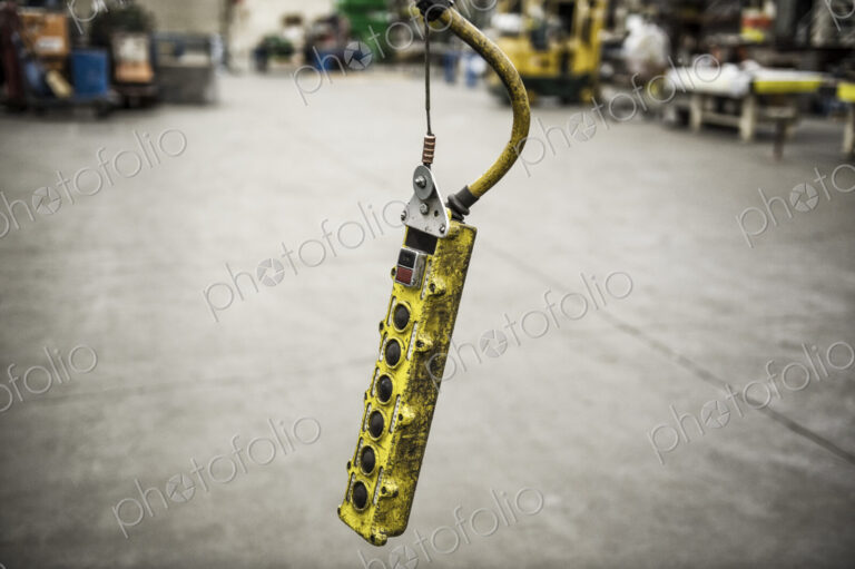 Overhead lift control unit used in a sheet metal factory.