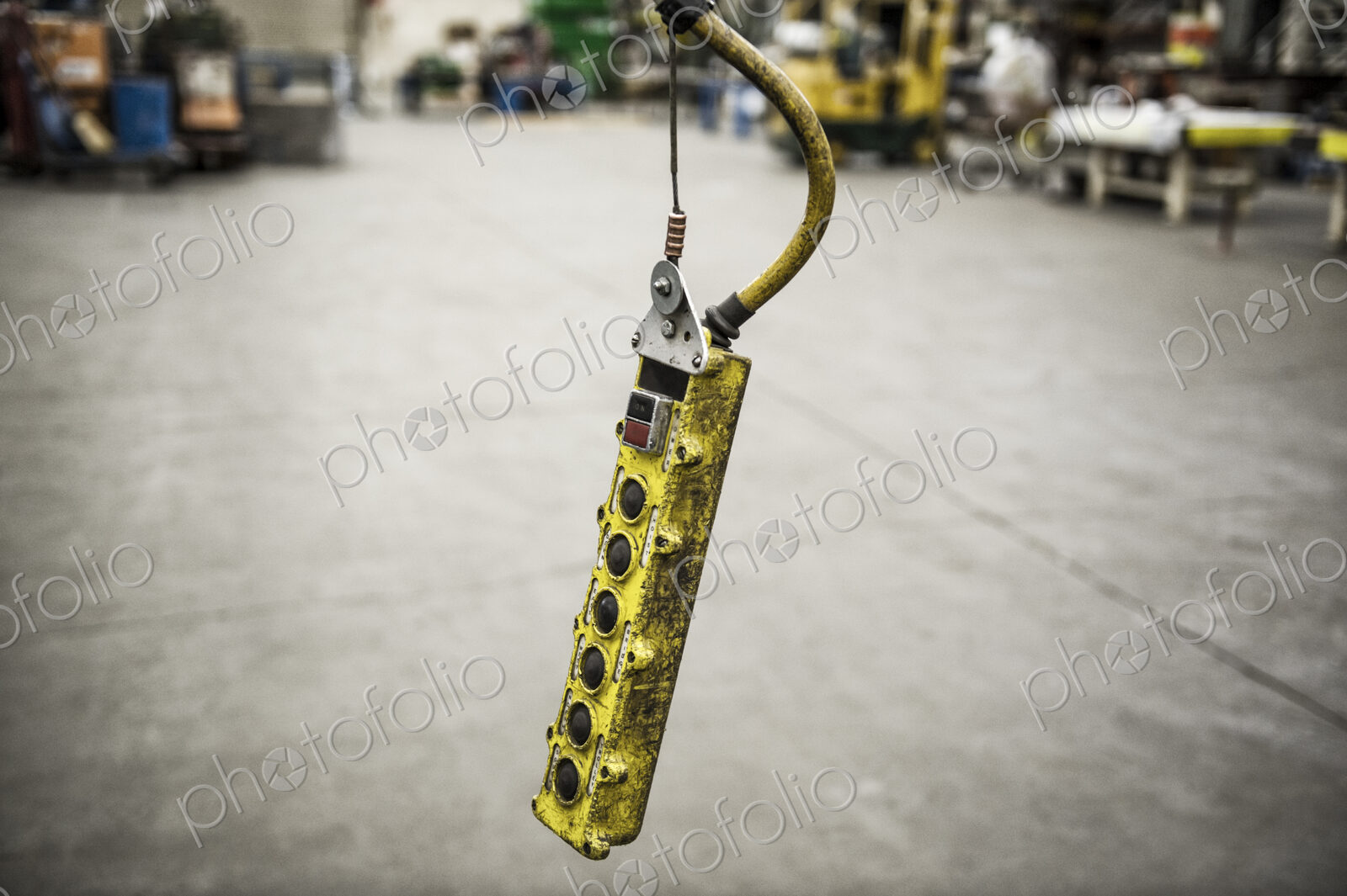 Overhead lift control unit used in a sheet metal factory.