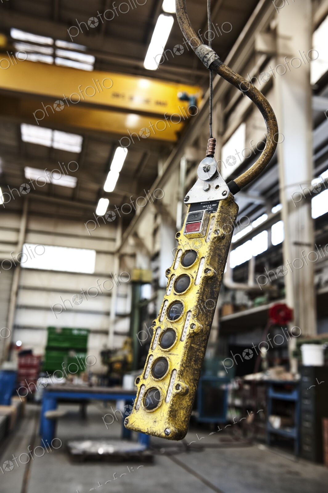 Overhead lift control unit used in a sheet metal factory.