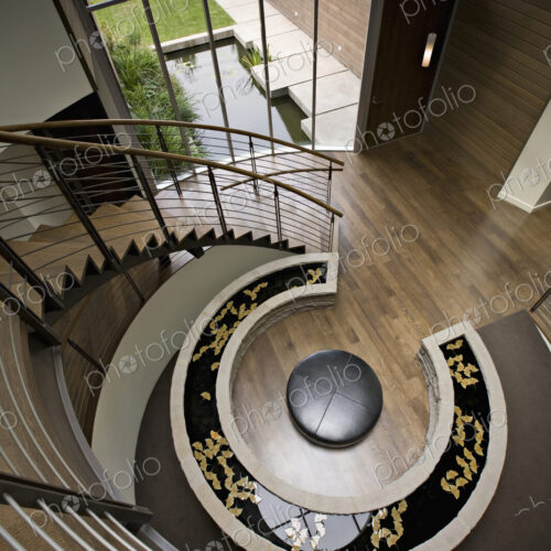 Overhead view of pond in modern foyer Overhead view of pond in modern foyer