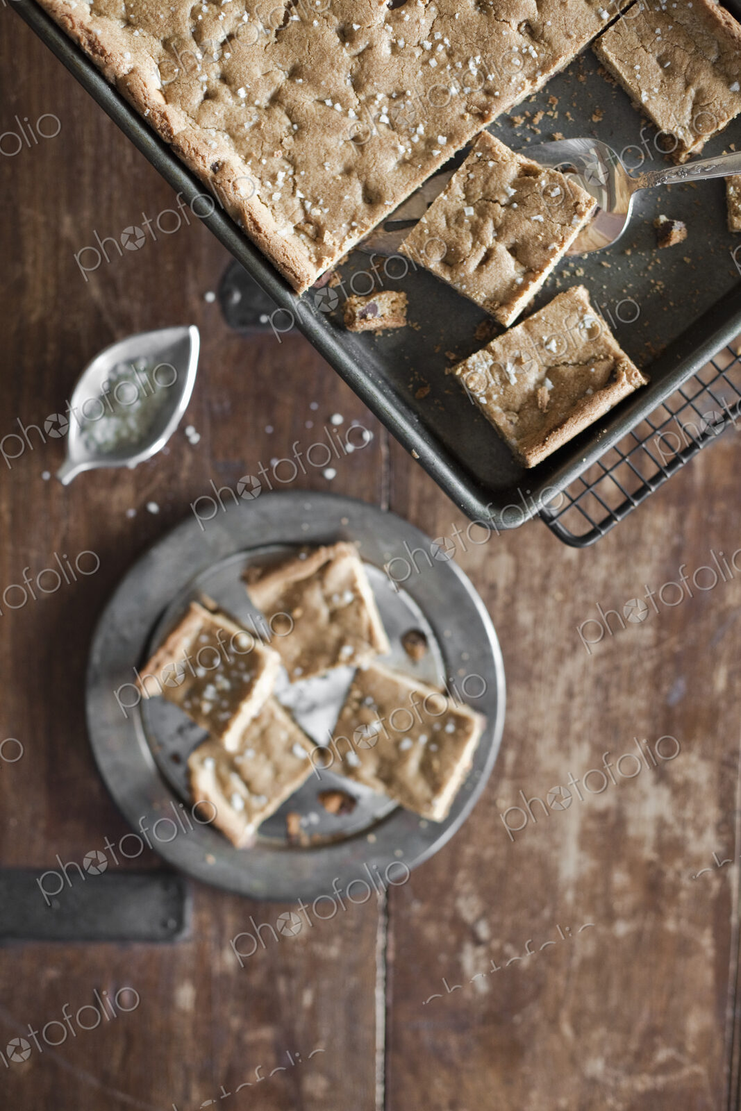 Overhead view. A tray bake, cake or biscuits cut into squares. Organic food.