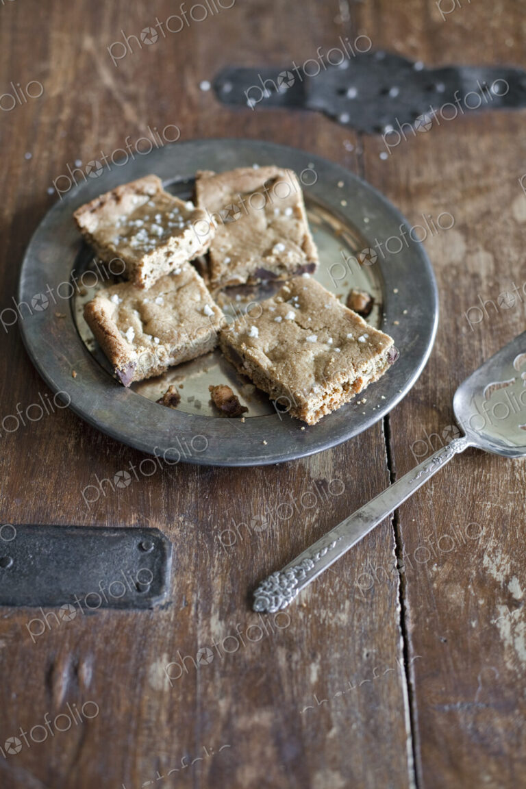 Overhead view. A tray bake, cake or biscuits cut into squares. Organic food.