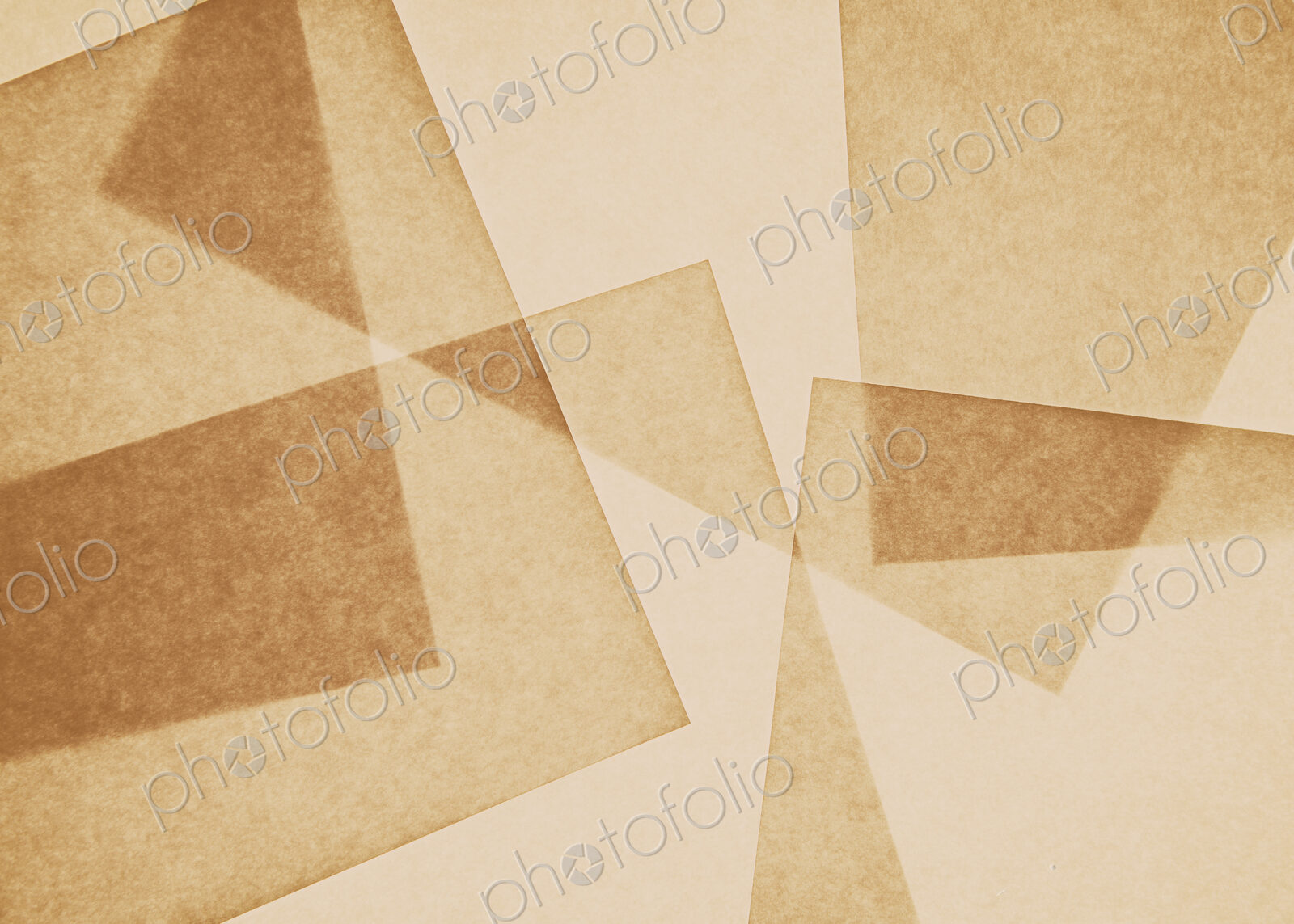 Overlapping pieces of recycled paper.