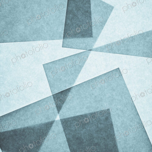 Overlapping pieces of recycled paper