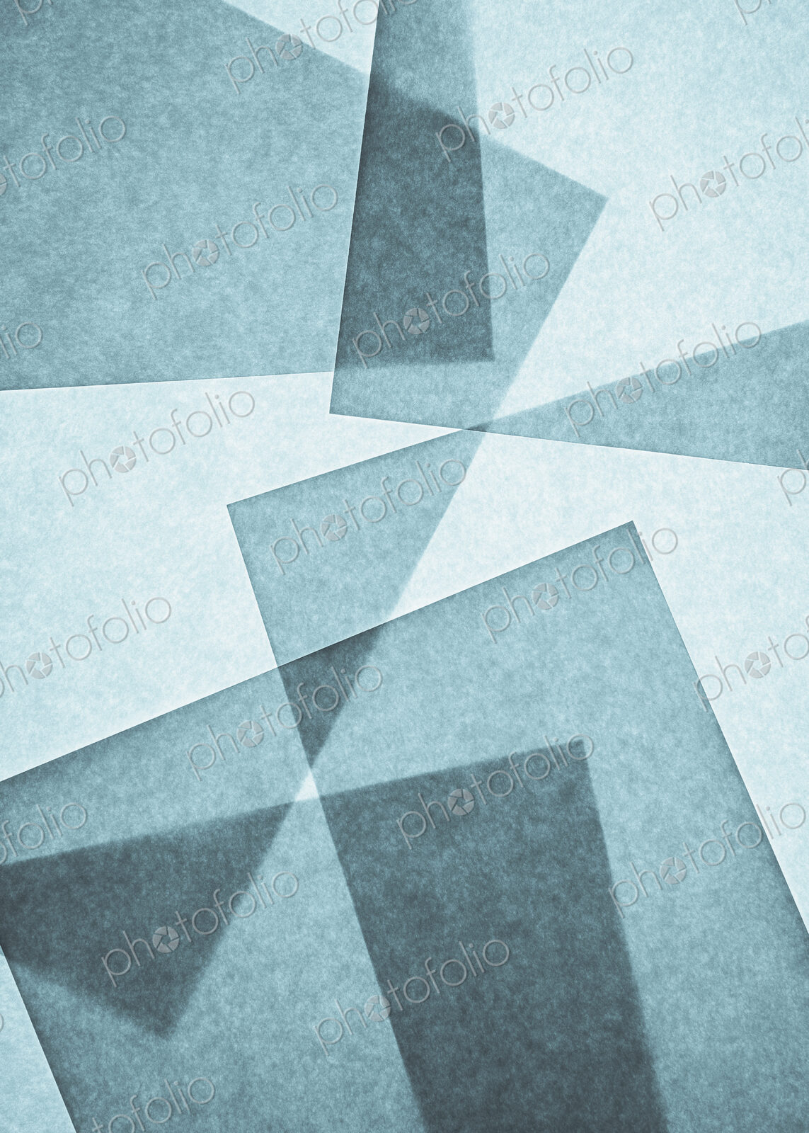 Overlapping pieces of recycled paper