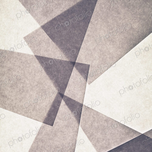 Overlapping pieces of recycled paper
