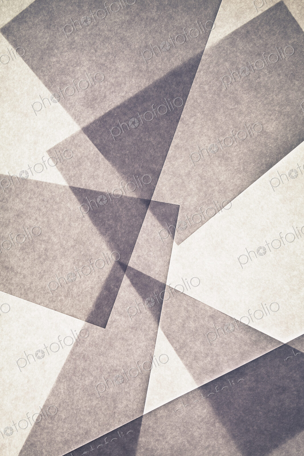 Overlapping pieces of recycled paper