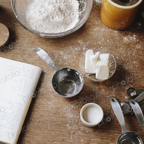 Overview of a kitchen table with ingredients for baking Overview of a kitchen table with ingredients for baking