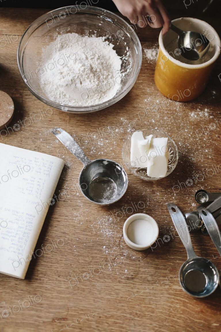 Overview of a kitchen table with ingredients for baking